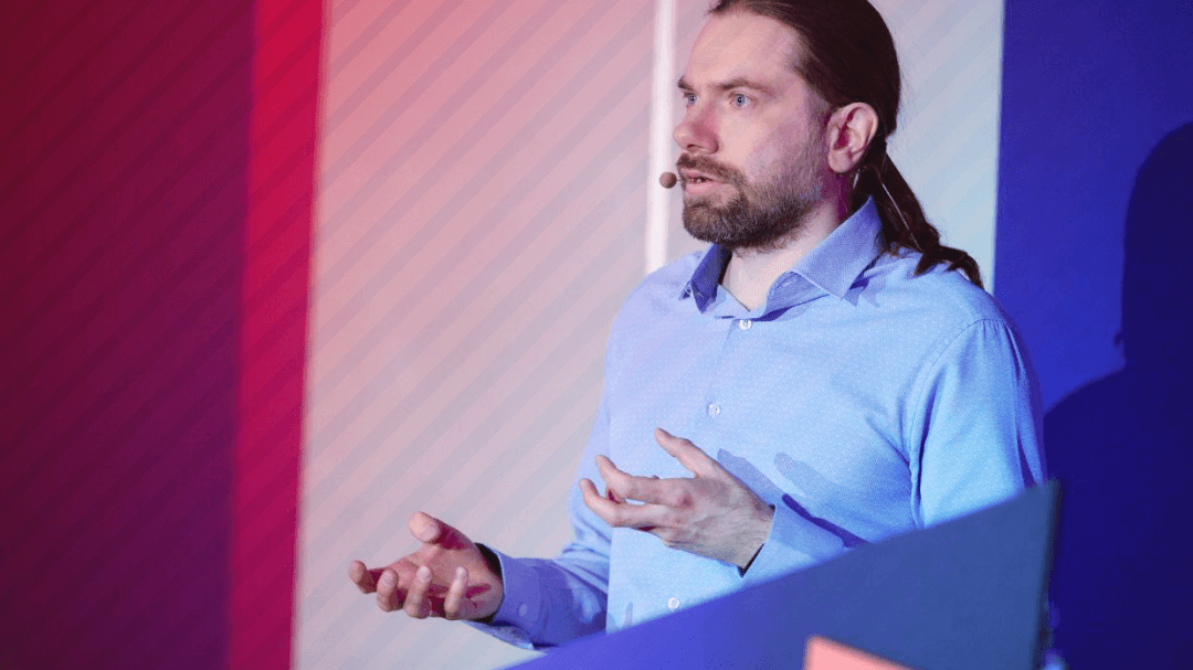 Pavel-Kozlov-at-DevOpsConf-2025.png